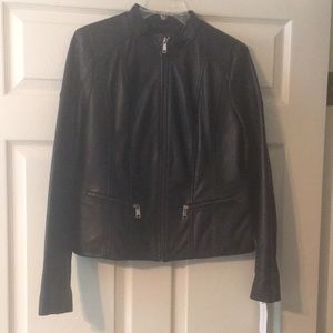 Black, never worn, genuine leather jacket